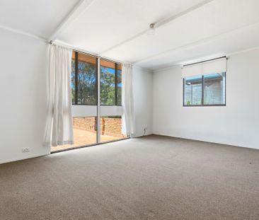 Comfortable & Convenient Living - Photo 1