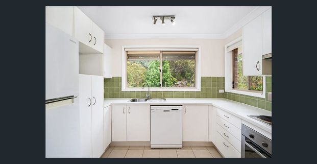 Unique renovated home with elevated bush views - Photo 1