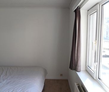 Ruime woning in rustige straat met garage en zonnig terras - Photo 4