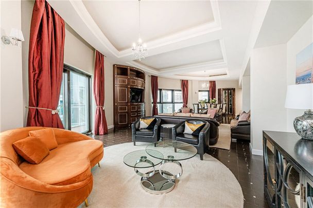 Stunning 3 bedroom penthouse overlooking the river, nearly 3000 feet, a large wraparound terrace and 2 parking spaces. Moment to the Uber Boat (Thames Clipper), Clapham Junction a short walk and Chelsea across the bridge. - Photo 1