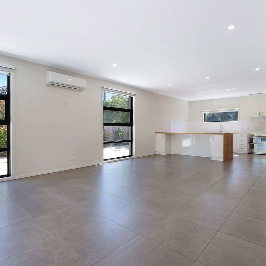 SPACIOUS AND CENTRAL FOUR BEDROOM TOWNHOUSE - Photo 1
