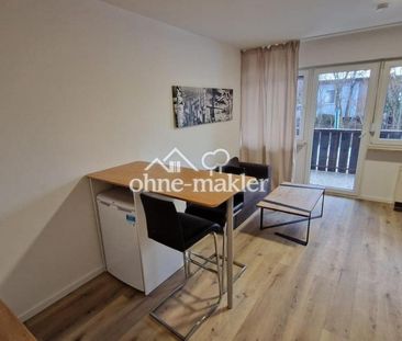 eine 1-Zimmer-Wohnung mit Balkon und EBK - Foto 1