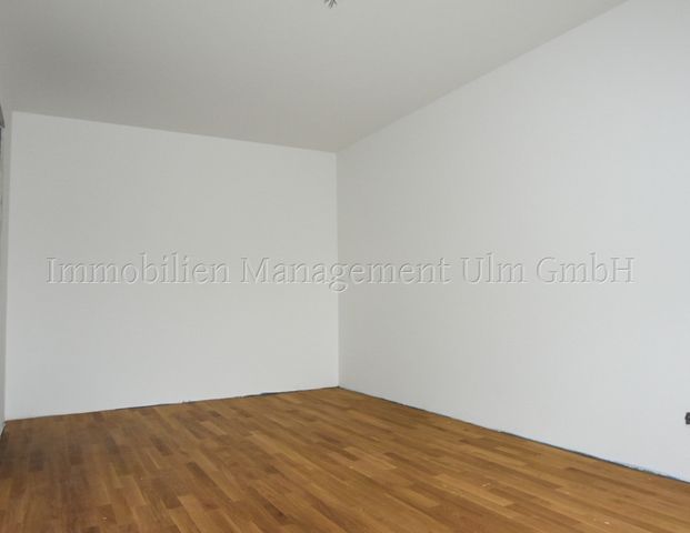 Wunderschöne 2-Zimmer-EG-Wohnung mit Terrasse und Tiefgaragenstellplatz! - Photo 1