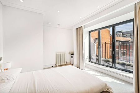 Arranged over two floors, a stunning three bedroom property with two private terraces. - Photo 4