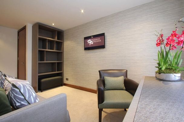 A smart, spacious two to three bedroom fully furnished with a large west-facing terrace situated on the 1st floor of this well run portered building with communal gardens in Knightsbridge village. EPC rating C | Council Tax Band H - Photo 1