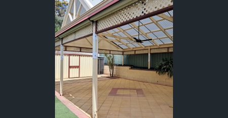 Spacious 4-Bedroom Home with Multiple Living Areas - Photo 4