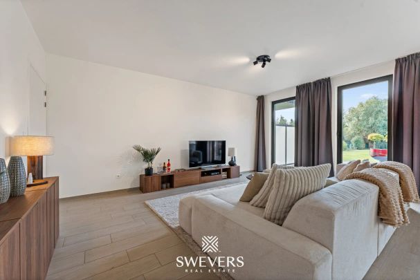 Appartement met twee autostaanplaatsen en terras met uitzicht op prachtige binnentuin - Photo 1