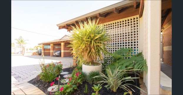 AMAZING 3x2x2 HOME OFFERING BEACH SIDE LIVING! - Photo 1