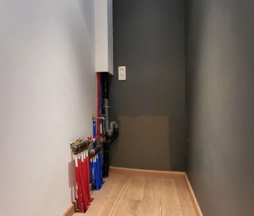 Deze instapklare woning biedt modern wooncomfort op een centrale li... - Photo 1