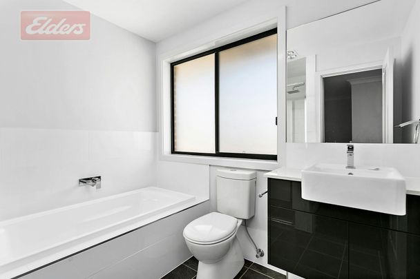 Quality Four Bedroom Duplex - Pet Friendly - Photo 1