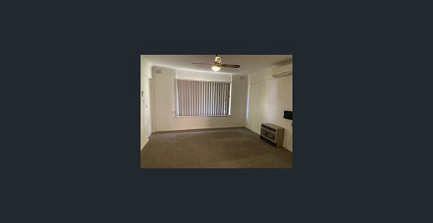 HOMETTE IN CONVENIENT LOCATION - Photo 1