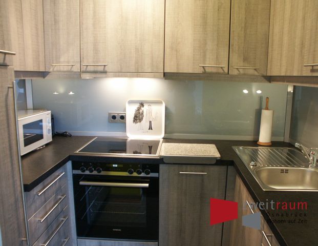 Hellern, stilvoll eingerichtetes Apartment mit Tiefgaragenstellplatz in ruhiger Wohnlage - Foto 1