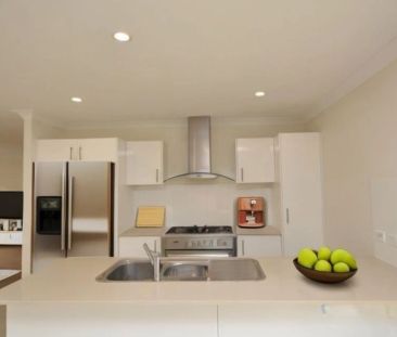Modern, low-maintenance living in a family-friendly pocket of Logan... - Photo 6