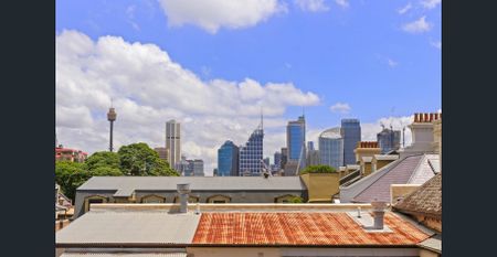 Rare Find - Bright, Oversized One-Bed with Two Balconies + Skyline Views - Photo 2