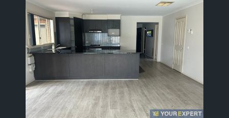 Generous 4-Bedroom Home Perfect for Families - Photo 2