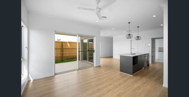 Brand New Family Home in Oxley's Premier New Estate - Photo 1