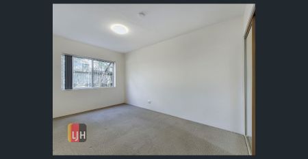 CENTRALLY LOCATED, 3 BEDROOM UNIT WITH A/C! - Photo 2