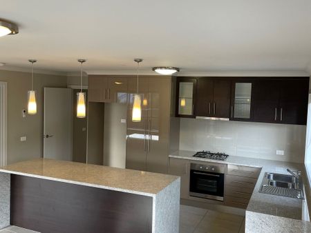 MODERN, PRIVATE AND WELL LOCATED! - Photo 2