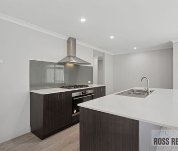 Stylish 4-Bedroom Home in Quiet Location - Photo 6