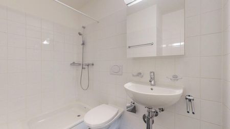 Appartement mansardé à la périphérie de la ville - Photo 5