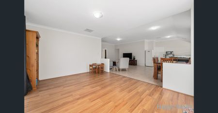 Spacious 4-Bedroom Family Home with Multiple Living Areas & Large Outdoor Patio - Photo 4