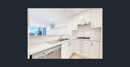 Modern Comfort Meets Coastal Convenience—Discover This Spacious 3-Bedroom Apartment - Photo 2