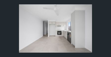 Modern, near new, and ready to welcome you home! - Photo 2