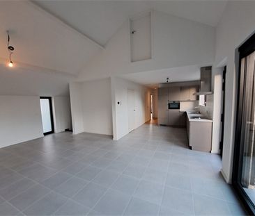 Een nieuwbouw appartement op de eerste verdieping met terras - Photo 1