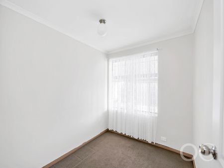 Open the Door to Comfortable Family Living in a Spacious Burton Home - Photo 5