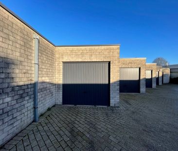 Gelijkvloersappartement met 2 slpks, privé tuintje én ruime garage - Foto 1