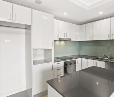 Stylish 1-Bedroom Apartment with Modern Amenities in Prime Location - Photo 6 | Rentumo