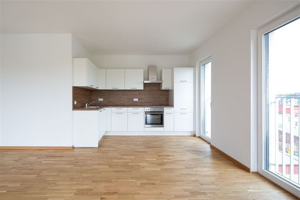 Schön geschnittene 2-Zi. Whg. mit EBK und Balkon, Parkett, FBH, TG-Stellpl. mgl. - Foto 1