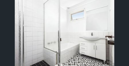 Expansive Full Brick Townhouse | Spacious Living | Prime Location - Photo 3