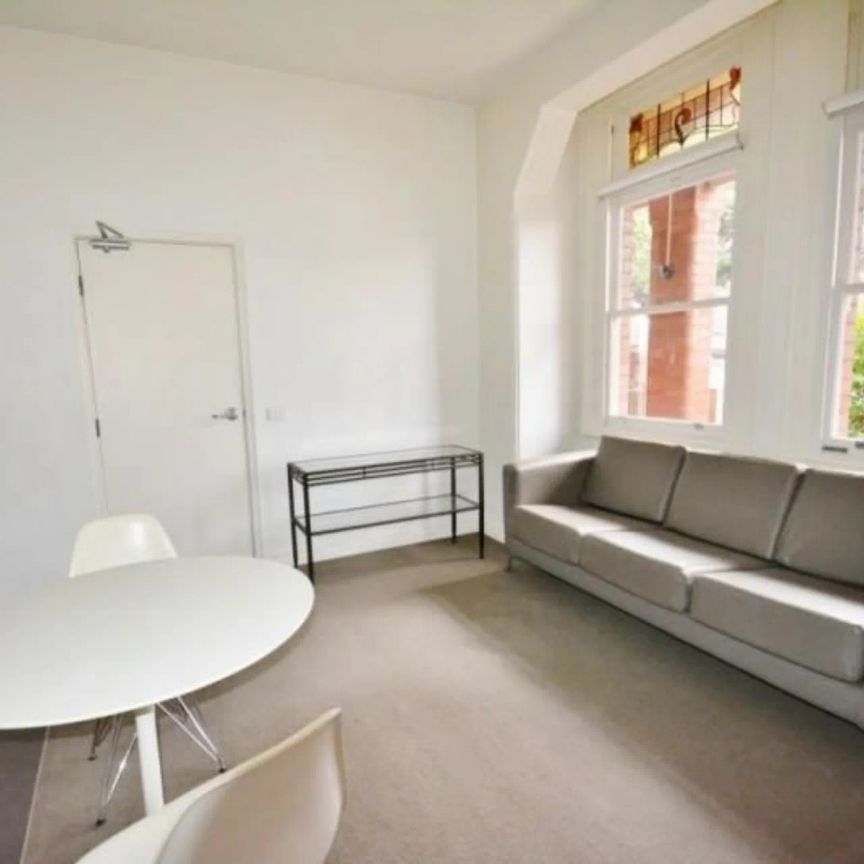 Boutique Furnished Studio Across from Calrton Gardens! - Photo 1