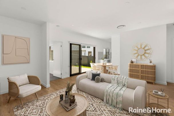 MODERN TOWNHOUSE IN QUIET COMPLEX - Photo 1