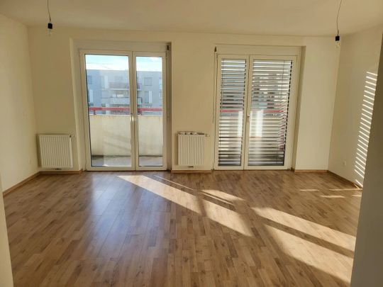 unbefristete 2-Zimmer-Wohnung mit großer Freifläche - 3. Zimmer möglich! - Photo 1