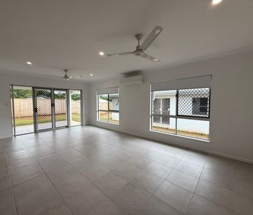 BRAND NEW FOUR BEDROOM HOME WITH MEDIA - Photo 1