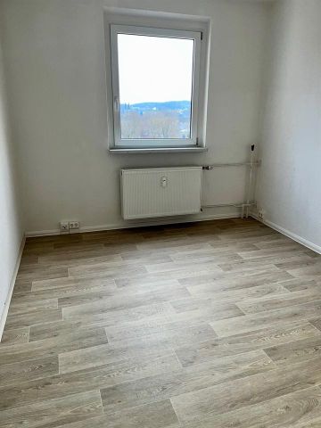 Helle 4-Raum-Wohnung mit zwei Balkonen und saniertem Bad im 4. OG - Photo 3