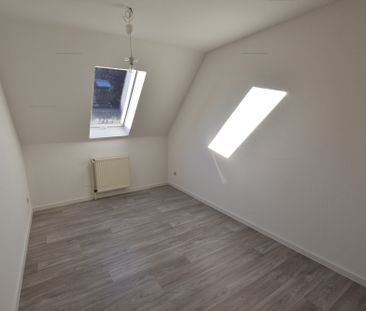 Zentral gelegene Obergeschosswohnung in Warsingsfehn - Foto 1
