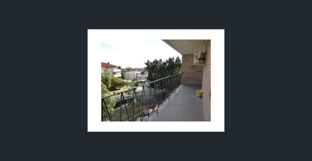 Top -Floor One-Bedroom Unit - Available Now - Photo 1