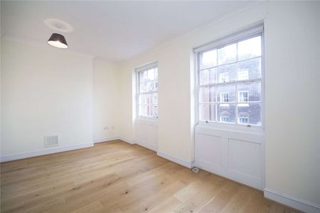 A spacious two bedroom split level flat on Exmouth Market - Photo 2