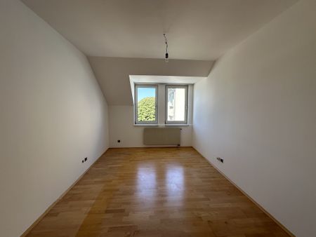 Großartige Dachgeschoßwohnung im Stadtzentrum mit Terrasse! - Photo 3