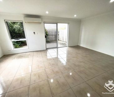 Townhouse - Garage and Carport - Photo 2