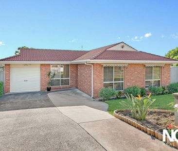 Family-Friendly Home In A Sought-After Street! - Photo 1