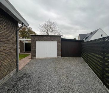 Ruime gezinswoning met tuin, vernieuwde keuken en veelzijdig atelier - Photo 3