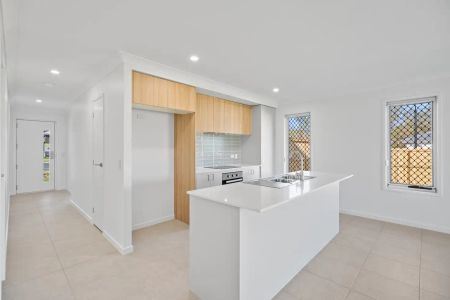 “BRAND NEW HOME WITH LARGE YARD & AIR-CONDITIONING!” - Photo 4