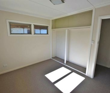 Spacious Family Home with Huge Yard, Side Access & Plenty of Storage! - Photo 5