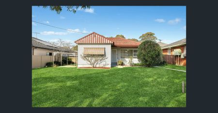 Perfect for families seeking comfort and convenience, really nice and presentable and located within a selective school zone. - Photo 4