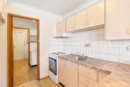 Tidy One-Bedroom Unit in Convenient Location – Water and Lawn Maintenance Included! - Photo 4