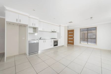 Single Level Townhouse with Lock up Garage - Photo 4